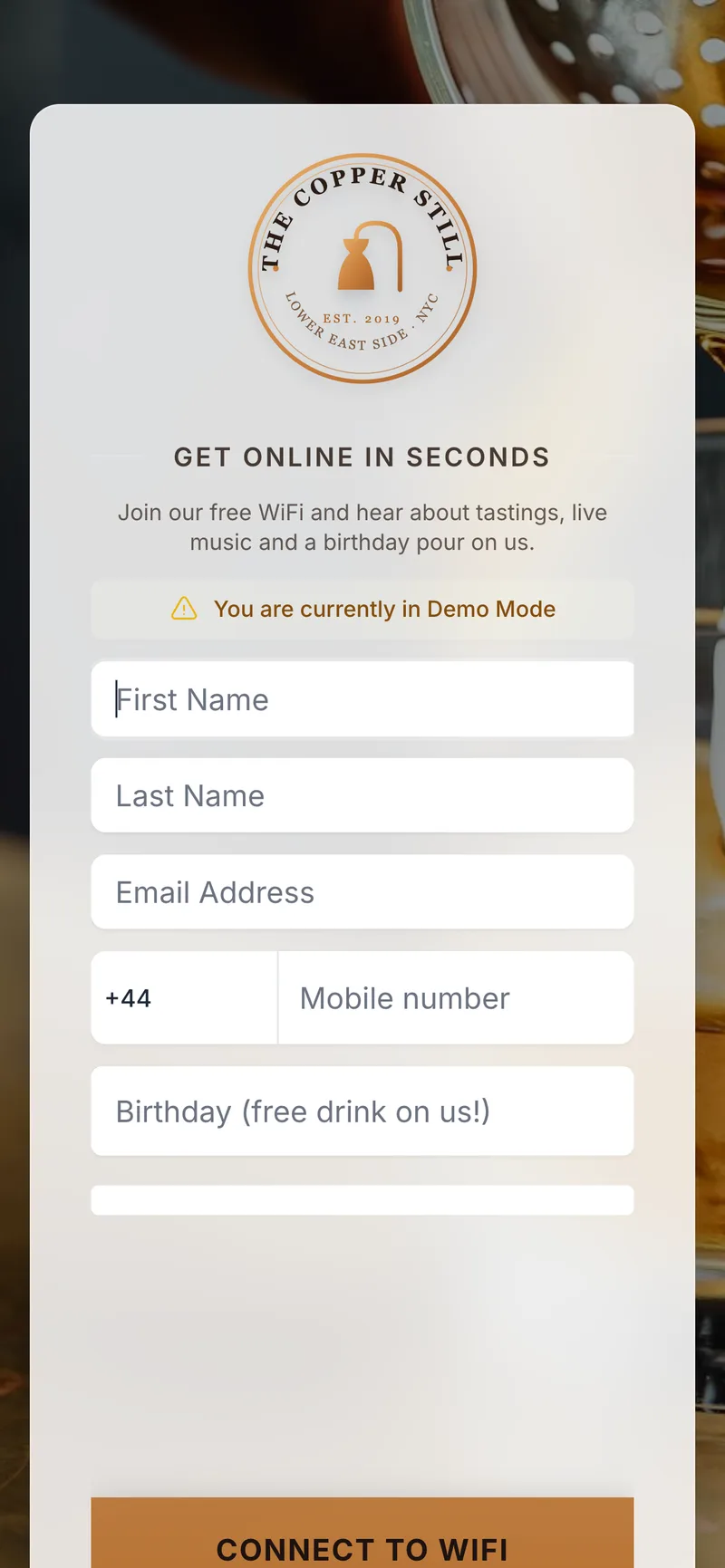 Mobile view of a CaptiFi splash page showing the guest details form with marketing consent checkboxes